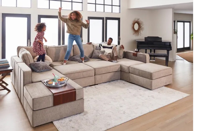 Family Jumping on Lovesac Sactional