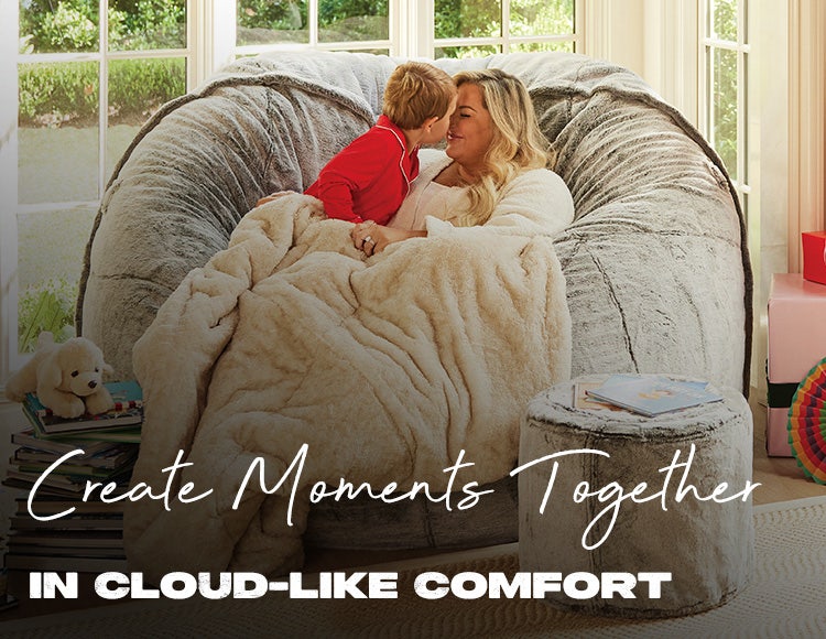 Parent and Child Relaxing on The BigOne with Squattoman in Living Room