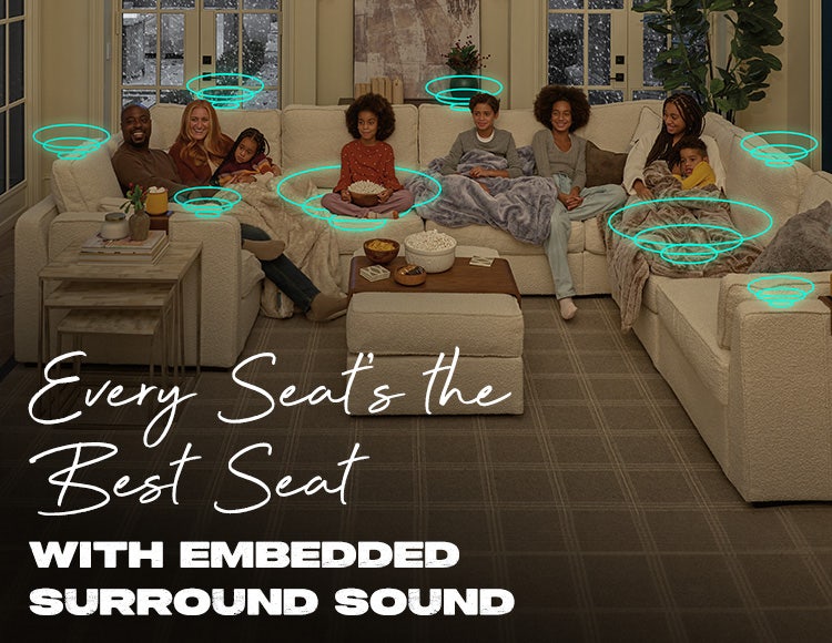 Family Experiencing Lovesac Sactionals with StealthTech Surround Sound in Living Room
