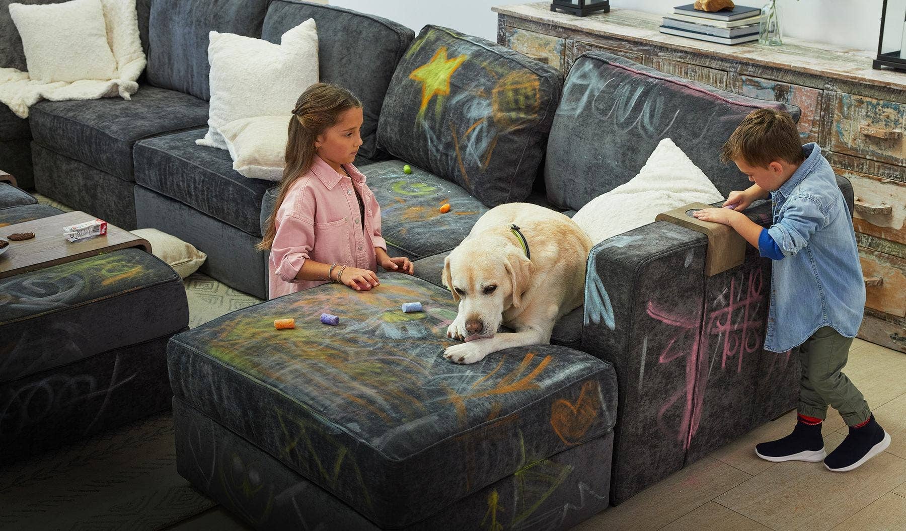 Couple re-arranging their Lovesac Sactional.