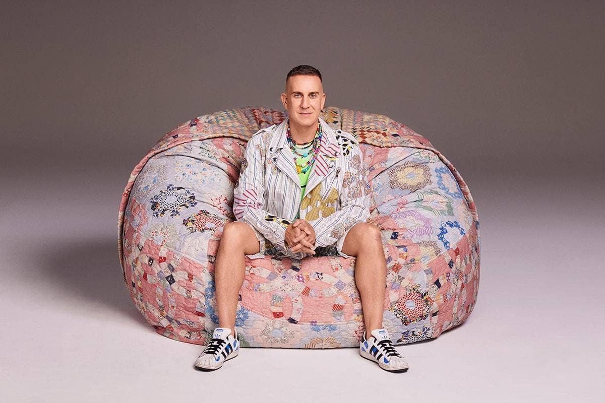 Jeremy Scott sitting in a limited edition SuperSac.
