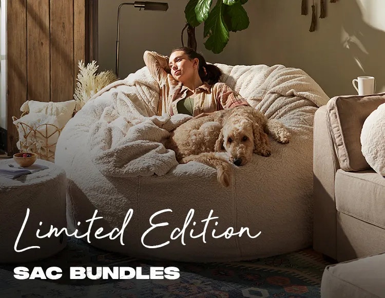 Woman Asleep with Footsac on The BigOne with Squattoman in Living Room