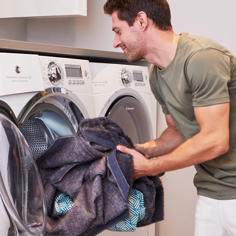 Man washing Lovesac Cover