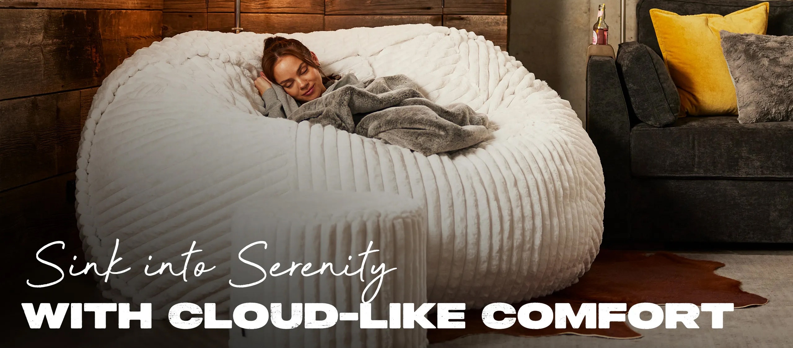 Woman Asleep with Footsac on The BigOne with Squattoman in Living Room