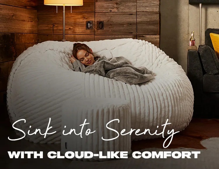 Woman Asleep with Footsac on The BigOne with Squattoman in Living Room