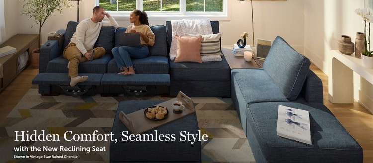 Couple working on a Lovesac couch