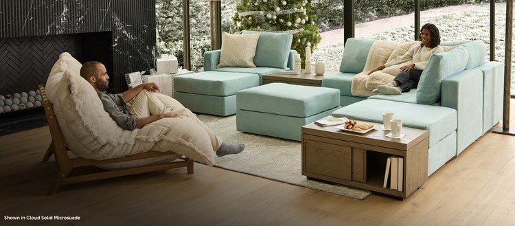People relaxing in their Lovesac sectional couch and accent chair