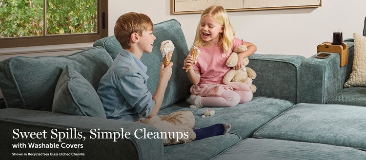 Couple setting up Lovesac sectional couch