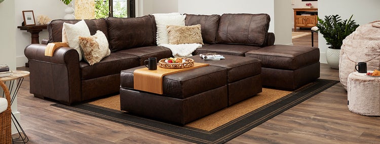 Brown leather Lovesac sectional couch