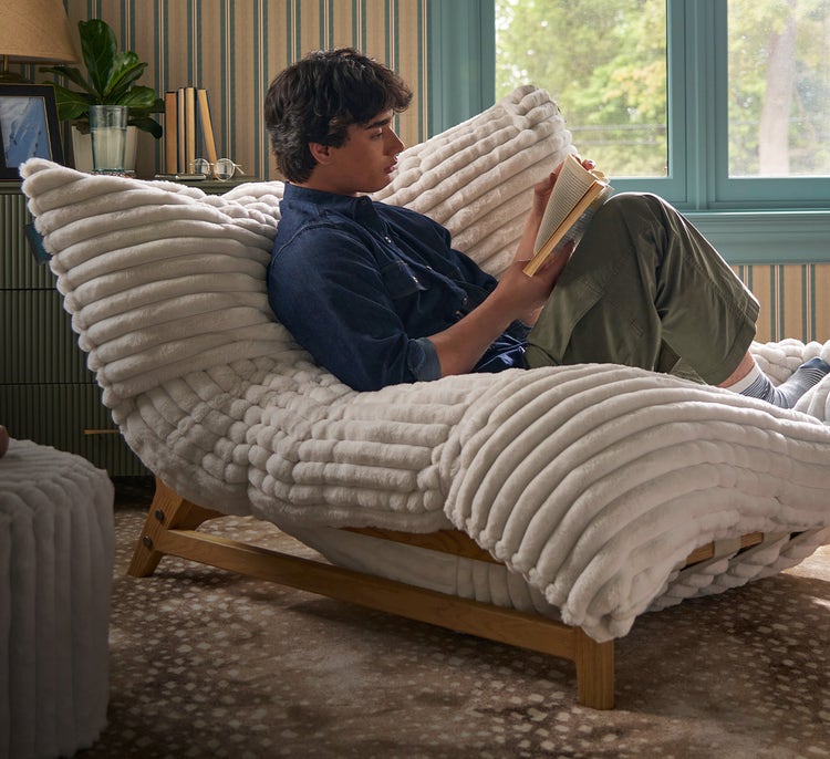 PillowSac Chair. Cloud-like comfort meets livingroom style. Shown in Dove Channeled Phur with Blonde Frame