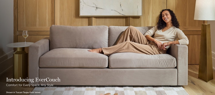 Woman lounging on a taupe, Lovesac EverCouch sofa in a living space