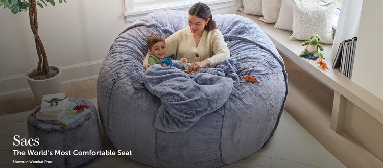 Woman and child sitting on a Lovesac Beanbag