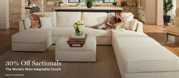 Women lounging on Lovesac sectional couch.