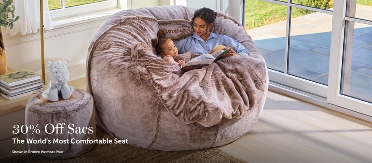 Woman and child sitting on a Lovesac Beanbag
