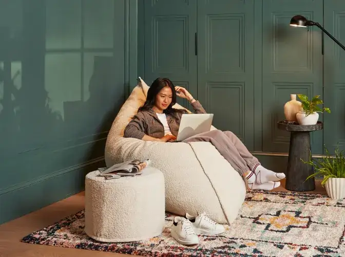 woman sitting in PillowSac guaranteed for a lifetime