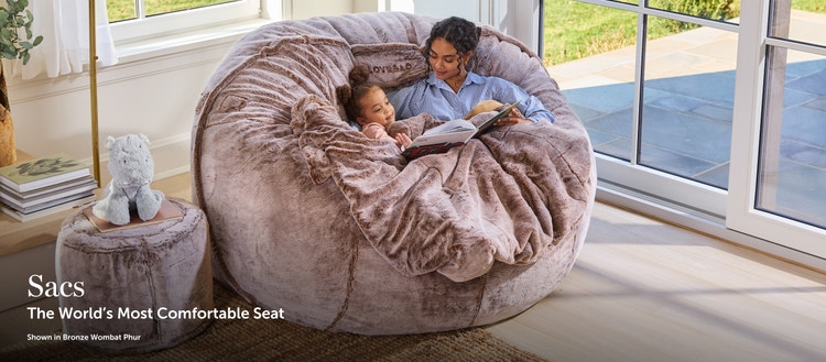 Woman and child sitting on a Lovesac Beanbag