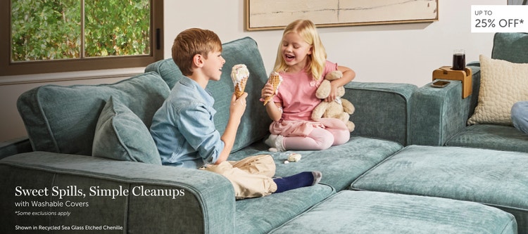 Children eating ice cream on a teal, Lovesac sectional couch