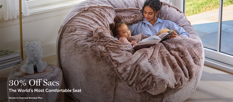 Woman and child sitting on a Lovesac Beanbag