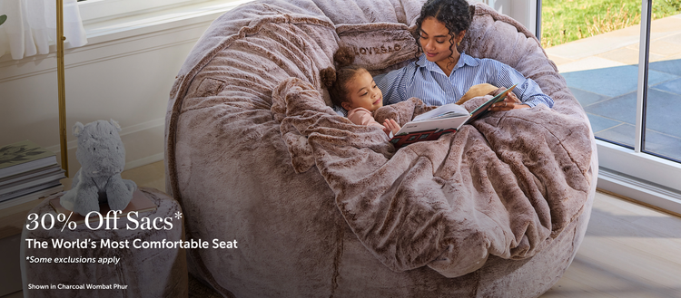 Woman and child sitting on a Lovesac Beanbag