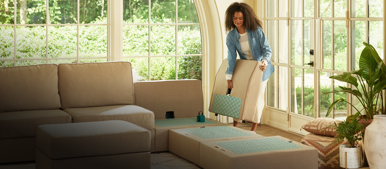 Couple rearranging their Lovesac sectional couch pieces